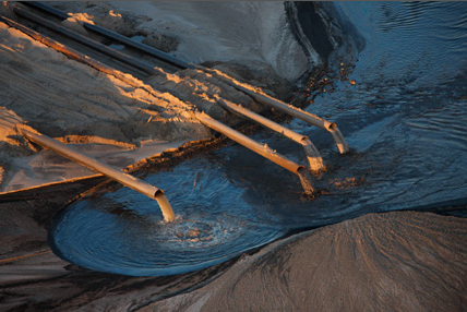 InLine Dewatering of Oil Sands Tailings