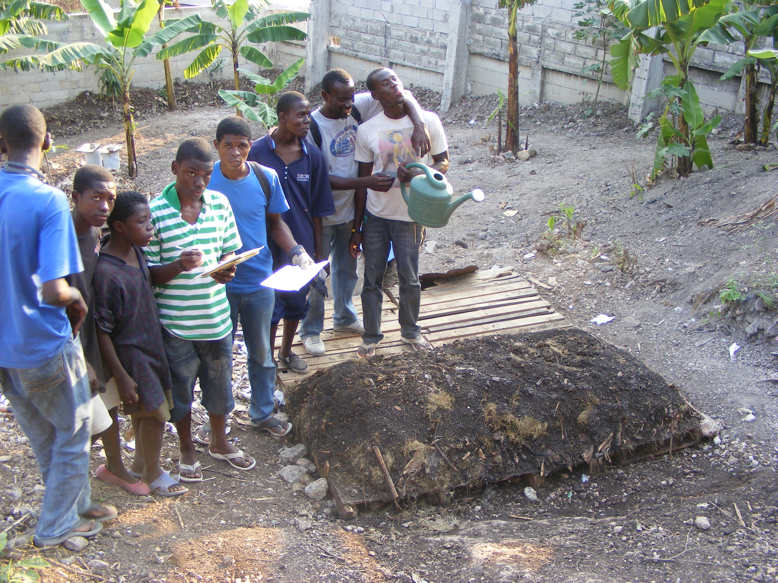 Photo from Haiti where students learn the Howard-Higgins System of DRY sanitation waste management. This saves large amounts of valuable water a...