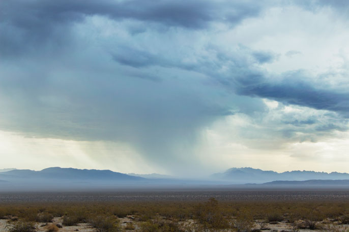 Decade of rising seas slowed by land soaking up extra water, study finds