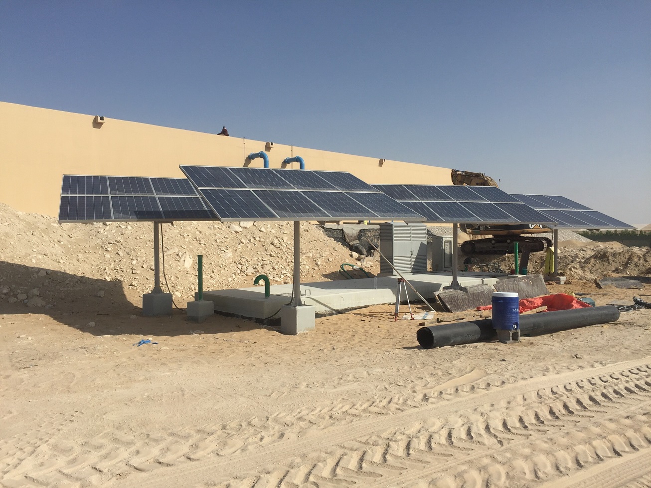 rotating solar panels powering electr valves for waterstorage tank