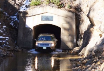 One Couple’s Ideal Job of Moving Water Under Mountains